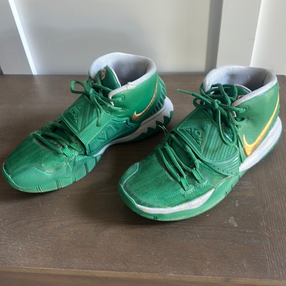 Custom Nike kyrie in green and gold.